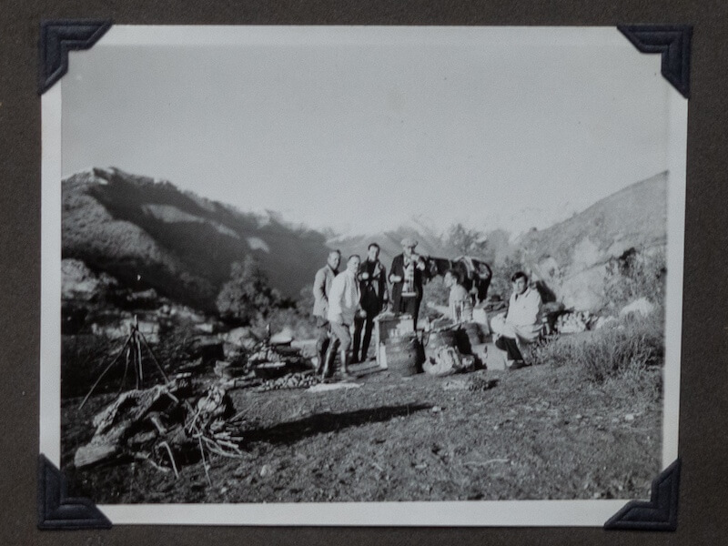 Antique black and white photo of 5 men camping in the mountains in 1931